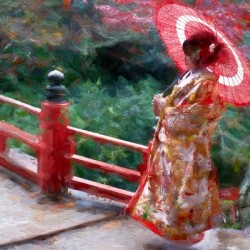 Geisha posing on Japanese bridge